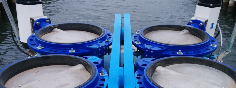 image of 4 large blue turbines used for wave energy measurements